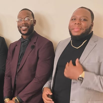 The hosts dressed up together for an event