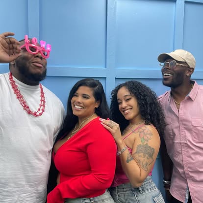 The hosts posing with guests after a recording