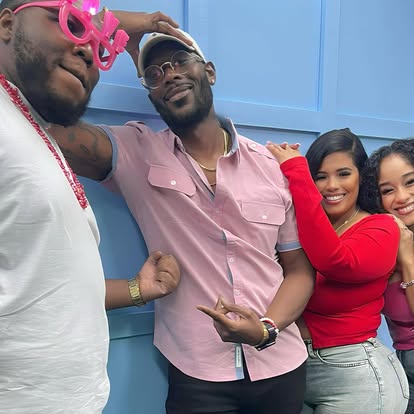 A candid group selfie with the hosts and studio guests